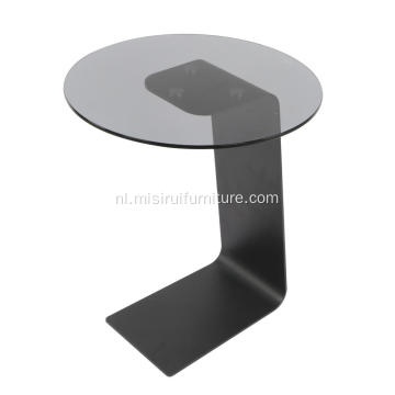 Woonkamer transparante zwarte glazen top salontafel
